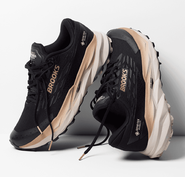 A pair of Brooks Cascadia 19 GTX trail running shoes with black uppers and beige soles